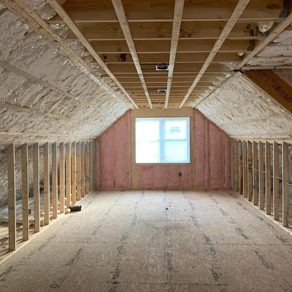 Attic with spray foam and fiberglass insulation