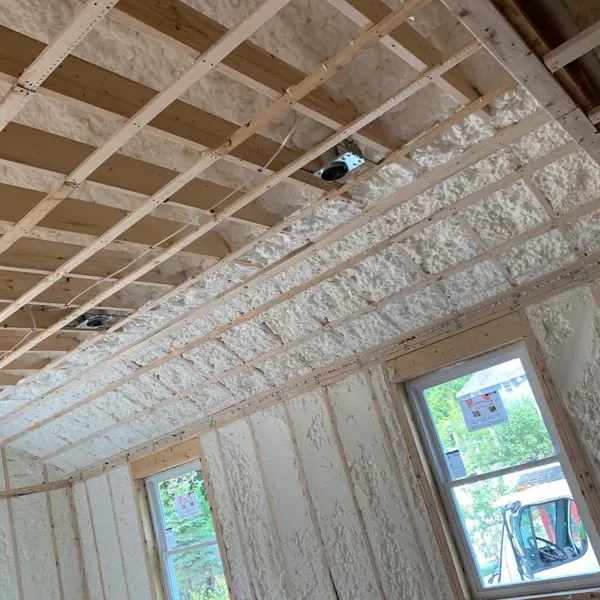 Room insulated with spray foam, windows framed