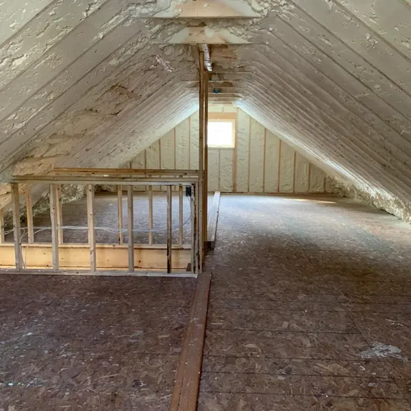 Attic roofline sealed with spray foam